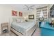 Bright bedroom with a king-size bed and coastal decor at 3310 Bay Ridge Way, Port Charlotte, FL 33953