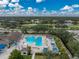 Community pool with lap lanes and a freeform leisure pool at 3310 Bay Ridge Way, Port Charlotte, FL 33953
