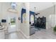 Light and bright entryway with view into home office and living spaces at 3310 Bay Ridge Way, Port Charlotte, FL 33953