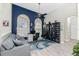 Home office with wood floors, built-in shelving, and a workspace at 3310 Bay Ridge Way, Port Charlotte, FL 33953