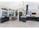 Open kitchen features an island, breakfast nook, and stylish cabinetry at 3310 Bay Ridge Way, Port Charlotte, FL 33953