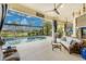 Relaxing pool area with wicker furniture and a view at 3310 Bay Ridge Way, Port Charlotte, FL 33953