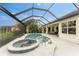 Relaxing pool and spa with covered patio and seating at 3310 Bay Ridge Way, Port Charlotte, FL 33953