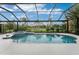 Stunning pool and spa with a covered patio at 3310 Bay Ridge Way, Port Charlotte, FL 33953