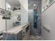 Spa-like shower with multi-function shower head and marble tile at 3310 Bay Ridge Way, Port Charlotte, FL 33953