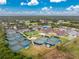Community tennis courts with surrounding green space at 3310 Bay Ridge Way, Port Charlotte, FL 33953