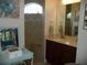 Bathroom with single vanity and walk-in shower at 380 Hoffer St, Port Charlotte, FL 33953