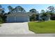 Beautiful home with three-car garage and paver driveway at 380 Hoffer St, Port Charlotte, FL 33953