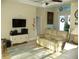 Comfortable living room with hardwood floors and lots of natural light at 380 Hoffer St, Port Charlotte, FL 33953