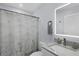 Clean bathroom with shower, sink, and marble countertop at 396 N Gulf Blvd, Placida, FL 33946