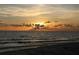 Stunning sunset over the ocean and beach at 396 N Gulf Blvd, Placida, FL 33946