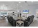Spacious living room featuring comfortable seating and a large TV at 396 N Gulf Blvd, Placida, FL 33946