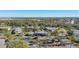Aerial view of condo community with landscaping and a pool at 4260 Placida Rd # 24B, Englewood, FL 34224