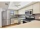 Well-equipped kitchen with stainless steel appliances at 4260 Placida Rd # 24B, Englewood, FL 34224