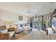 Light and airy living room with comfortable seating and a TV at 4260 Placida Rd # 24B, Englewood, FL 34224