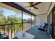 Enjoy this screened balcony with outdoor furniture at 4260 Placida Rd # 24B, Englewood, FL 34224