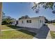 Side view of the house showing exterior and landscaping at 450 Blackburn St, Englewood, FL 34223