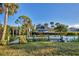 Private dock with boat lift, offering water access at 4696 Pompano St, Placida, FL 33946