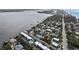 Magnificent aerial view showcasing waterfront homes and gorgeous coastline at 5031 N Beach Rd # 116, Englewood, FL 34223