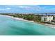 Breathtaking beach view with crystal clear water meets sandy shorelines offering luxury living at 5031 N Beach Rd # 116, Englewood, FL 34223