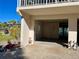 Covered carport area offering convenient parking with extra storage in this well-maintained home at 5031 N Beach Rd # 116, Englewood, FL 34223