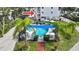 A beautiful outdoor pool area with lounge chairs and shade, perfect for relaxing in the Florida sunshine at 5031 N Beach Rd # 116, Englewood, FL 34223