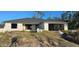 Newly constructed one-story home with a grey roof and block exterior at 5306 Jennings Blvd, Port Charlotte, FL 33981