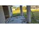 Unfinished concrete patio area with block walls and surrounding vegetation at 5306 Jennings Blvd, Port Charlotte, FL 33981