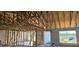 New home interior under construction with exposed beams and walls at 5306 Jennings Blvd, Port Charlotte, FL 33981