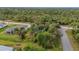 Property overview showing home, yard, and surrounding area at 5400 Jennings Blvd, Port Charlotte, FL 33981