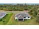 Single-story house with screened-in lanai and backyard at 5400 Jennings Blvd, Port Charlotte, FL 33981