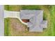 Single-Gathering home with grey roof and landscaped yard at 5400 Jennings Blvd, Port Charlotte, FL 33981