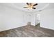 Bright and airy bedroom with wood-look floors at 5400 Jennings Blvd, Port Charlotte, FL 33981