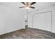 Bedroom with ceiling fan and access to bathroom at 5400 Jennings Blvd, Port Charlotte, FL 33981