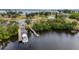 Aerial photo showing a boat being launched at a community boat ramp at 5400 Jennings Blvd, Port Charlotte, FL 33981