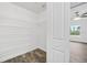 Spacious walk-in closet with wire shelving and wood-look tile flooring at 5400 Jennings Blvd, Port Charlotte, FL 33981