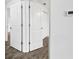 Clean hallway with access to bedrooms and other rooms at 5400 Jennings Blvd, Port Charlotte, FL 33981