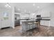Modern kitchen with granite countertop island and stainless steel appliances at 5400 Jennings Blvd, Port Charlotte, FL 33981