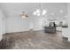 Open concept living room and kitchen with hardwood floors at 5400 Jennings Blvd, Port Charlotte, FL 33981