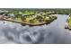 An aerial view of a waterfront park with benches and trees at 5400 Jennings Blvd, Port Charlotte, FL 33981