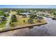 Aerial view of a waterfront park with playground and benches at 5400 Jennings Blvd, Port Charlotte, FL 33981