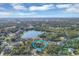 Aerial view of a single-Gathering home with a lake nearby at 6256 Pennell St, Englewood, FL 34224