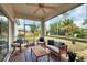 Relaxing screened porch with seating and outdoor views at 6256 Pennell St, Englewood, FL 34224