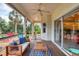 Cozy screened porch, complete with a hammock and patio furniture at 6256 Pennell St, Englewood, FL 34224