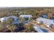 Complex overview showcasing building location and landscaping at 6800 Placida Rd # 165, Englewood, FL 34224