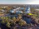Aerial view of condo community near water at 6800 Placida Rd # 165, Englewood, FL 34224