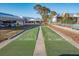 Shuffleboard court with green surface and painted lines at 6800 Placida Rd # 165, Englewood, FL 34224