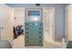 Bedroom with a dresser, closet, and access to a bathroom at 6800 Placida Rd # 165, Englewood, FL 34224