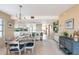 Bright dining room with a round table, creating a comfortable and inviting atmosphere at 6800 Placida Rd # 165, Englewood, FL 34224