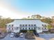 Ground-level view of the condo building at 6800 Placida Rd # 165, Englewood, FL 34224
